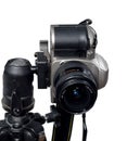 Slr/dslr camera mounted on tripod Royalty Free Stock Photo