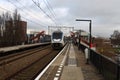 SLT train along platform of station Nieuwerkerk aan den IJssel Royalty Free Stock Photo