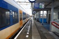 SLT train along platform of station Nieuwerkerk aan den IJssel Royalty Free Stock Photo