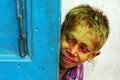 A Slum boy During Holi festival Royalty Free Stock Photo