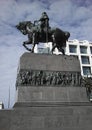 Equestrian statue prominently displayed atop a large stone pedestal Royalty Free Stock Photo