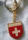 A keychain featuring the Swiss national coat of arms design. Royalty Free Stock Photo