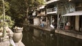 Slums house poor ramshakle of Southeast Asia along the Klong River. Thailand, Bangkok photo.