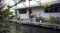 Slums house poor ramshakle of Southeast Asia along the Klong River. Thailand, Bangkok photo.