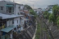 Slums by a rail track in Vietnam.