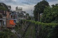 Slums by a rail track in Vietnam.