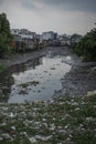 Slums by a river in Ho Chi Minh City, Vietnam.