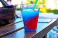 Having a slush puppie drink outside. Royalty Free Stock Photo