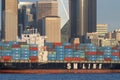 SM Line container ship Qingdao in front of Seattle skyline with company name