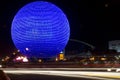 SM Mall of Asia (MOA) Globe and blurry night traffic lights Royalty Free Stock Photo