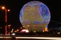 SM Mall of Asia (MOA) Globe and blurry night traffic lights Royalty Free Stock Photo