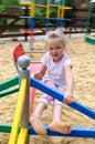 Smail little girl on playground