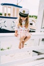 Smailing little girl enjoying sailing on a luxury yacht Royalty Free Stock Photo