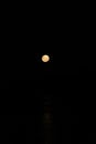 Smal blood moon in black sky Royalty Free Stock Photo