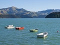 Smal oared boats on a lake in New Zealand Royalty Free Stock Photo