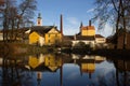 A small abandoned brewery reflecting on the surface.