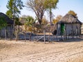 Small African village road, homes and people of Gweta Botswana