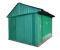 Small aged green metal shed barn isolated