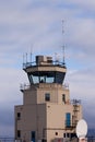 Small air traffic control tower man behind glass Royalty Free Stock Photo