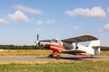 Small aircraft with propeller in parking lot. Royalty Free Stock Photo