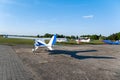 Small aircraft with propeller in parking lot