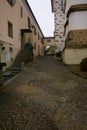 Small alley way between two large historic buildings Royalty Free Stock Photo