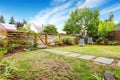 Small American house exterior with Green front yard.