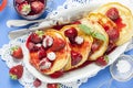 Small American Pancakes with Strawberry and Raspberry Royalty Free Stock Photo