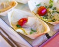 Small appetizers with swordfish and cherry tomatoes Royalty Free Stock Photo