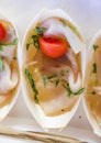 Small appetizers with swordfish and cherry tomatoes Royalty Free Stock Photo