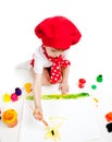 Small artist kid girl painting with brush Royalty Free Stock Photo