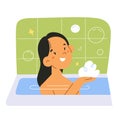 Small asian girl washes in bathtub with bubbles, child washes in the bathroom, bathing and smiling, childrens hygiene