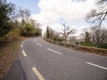 Small asphalt road with stunning nature scenery in county Kerry, Ireland. Amazing Irish landscape by a popular travel rout for Royalty Free Stock Photo