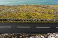 Small asphalt road on West coast of Ireland by Atlantic ocean, part of Wild Atlantic Way route. Burren area, Ireland. Traditional Royalty Free Stock Photo