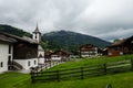 A small austrian village with typical houses and a church Royalty Free Stock Photo