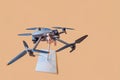 small automatic electronic drone with camera and four propellers. Modern drone