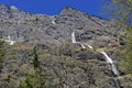 Small snow slip at mountain massif in spring Royalty Free Stock Photo