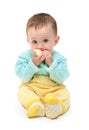 Small baby biting apple Royalty Free Stock Photo