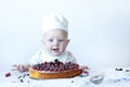 Small baby confectioner. Royalty Free Stock Photo