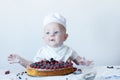 Small baby confectioner. Royalty Free Stock Photo