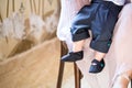 Small baby feet with shoes Royalty Free Stock Photo