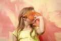 Small baby girl in orange sunglasses and yellow shirt Royalty Free Stock Photo
