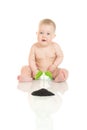 Small baby with green plant isolated Royalty Free Stock Photo