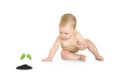 Small baby with green plant isolated Royalty Free Stock Photo