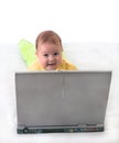 Small baby with laptop