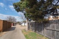 Small back alley at suburban neighborhood in North Dallas, Texa Royalty Free Stock Photo