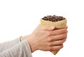 A small bag of coffee beans in female hands Royalty Free Stock Photo