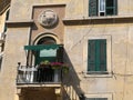 Small balconie of a traditional building in the district Garbatella to Rome in Italy.