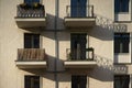 Small balconies cast shadows Royalty Free Stock Photo