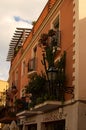 Small balcony beautifully decorated with various plants and flowers Royalty Free Stock Photo